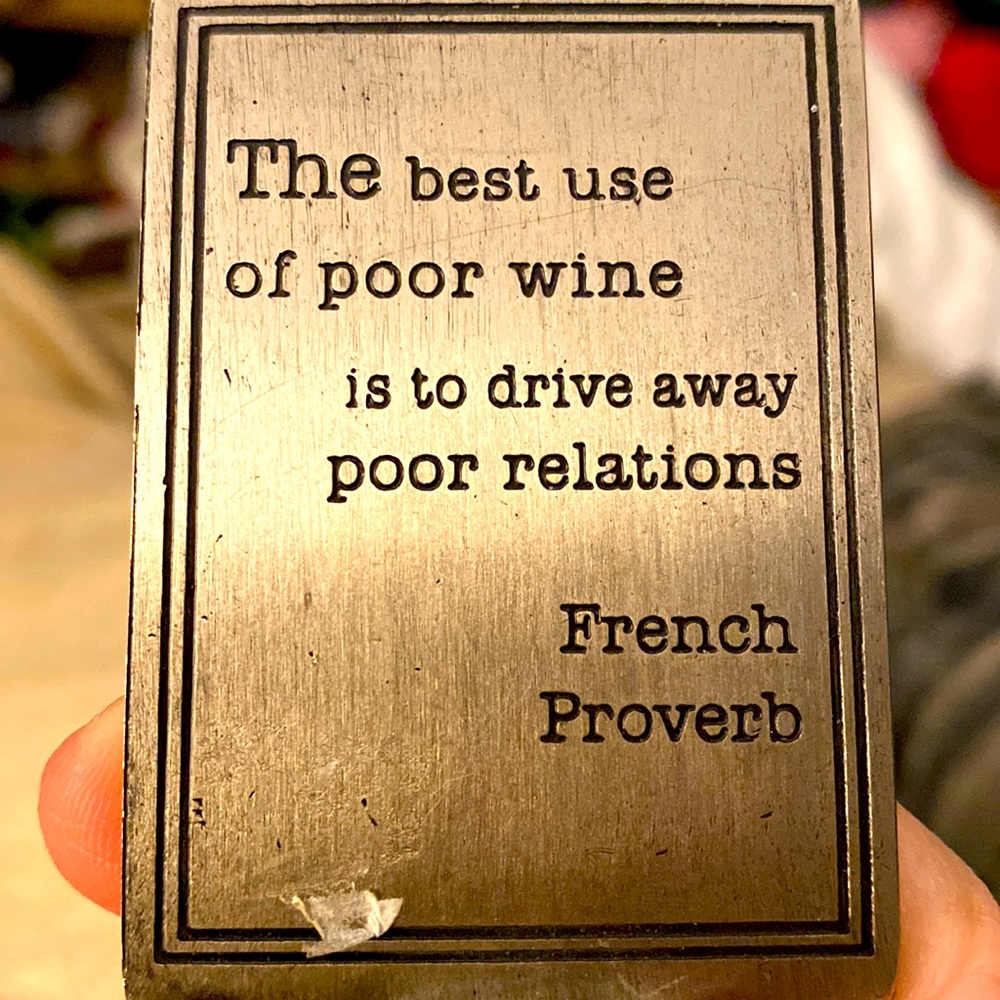 Wine stopper says the best use of pour wine is to drive away for relations